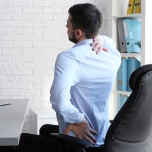 Posture,Concept.,Man,Suffering,From,Back,Pain,While,Working,With